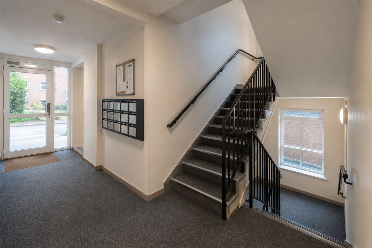 Clean apartment block communal entrance and stairwell